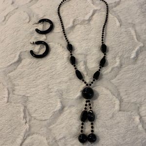 Black necklace with yellow tiny beads and black earrings